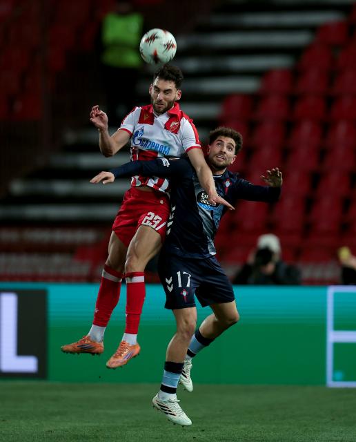 (260130) -- BELGRADE, Jan. 30, 2026 (Xinhua) -- Crvena Zvezda's Nayair Tiknizyan (L) vies with Celta Vigo's Javi Rueda during the UEFA Europa League football match between Crvena Zvezda and Celta Vigo in Belgrade, Serbia, on Jan. 29, 2026. (Photo by Predrag Milosavljevic/Xinhua)
