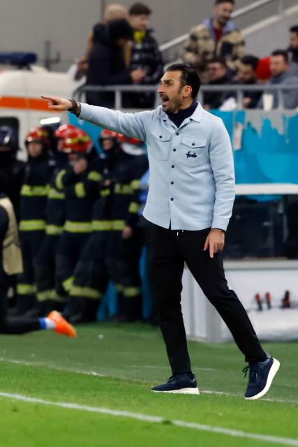 (260130) -- BUCHAREST, Jan. 30, 2026 (Xinhua) -- FCSB's coach Elias Charalambous gestures during the UEFA Europa League football match between Fenerbahce and FCSB at Arena Nationala stadium in Bucharest, Romania, Jan. 29, 2026. (Photo by Cristian Cristel/Xinhua)