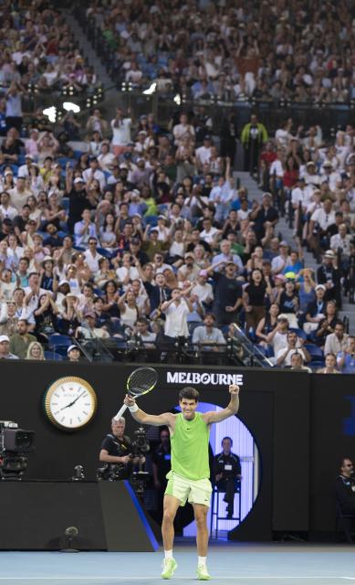 (260130) -- MELBOURNE, Jan. 30, 2026 (Xinhua) -- Carlos Alcaraz reacts after the men's singles semifinal match between Carlos Alcaraz of Spain and Alexander Zverev of Germany at the Australian Open tennis tournament in Melbourne, Australia, Jan. 30, 2026. (Photo by Hu Jingchen/Xinhua)