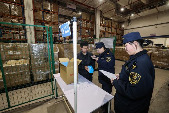 (260130) -- YIWU, Jan. 30, 2026 (Xinhua) -- Customs officers conduct inspections at the warehouse of a cross-border e-commerce enterprise at the Yiwu Comprehensive Bonded Zone in Yiwu, east China's Zhejiang Province, Jan. 30, 2026. The city of Yiwu, known as "the world's supermarket," in east China's Zhejiang Province, has seen China-Europe freight trains transporting European goods for customers to choose for the upcoming Spring Festival.
   The Spring Festival, or the Chinese New Year, falls on Feb. 17 this year.
   From Jan. 1 to 28 this year, a total of 208 China-Europe freight trains have operated here, carrying daily necessities and smart home appliances outbound, and loading with wine, ham, dairy products, and other items on the return journey. (Xinhua/Xu Yu)