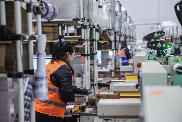 (260130) -- YIWU, Jan. 30, 2026 (Xinhua) -- A staff member packs imported goods orders that have completed customs declaration at the cross-border e-commerce warehouse at Yiwu Comprehensive Bonded Zone in Yiwu, east China's Zhejiang Province, Jan. 30, 2026.
  The city of Yiwu, known as "the world's supermarket," in east China's Zhejiang Province, has seen China-Europe freight trains transporting European goods for customers to choose for the upcoming Spring Festival.
   The Spring Festival, or the Chinese New Year, falls on Feb. 17 this year.
   From Jan. 1 to 28 this year, a total of 208 China-Europe freight trains have operated here, carrying daily necessities and smart home appliances outbound, and loading with wine, ham, dairy products, and other items on the return journey. (Xinhua/Xu Yu)