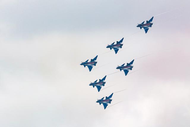 (260130) -- SINGAPORE, Jan. 30, 2026 (Xinhua) -- Aircraft of the Bayi Aerobatic Team of the Chinese People's Liberation Army (PLA) Air Force conduct training exercises for the 10th Singapore Airshow over the sea near Singapore's Changi Airport in Singapore, Jan. 30, 2026. (Photo by Zhu Jianghai/Xinhua)