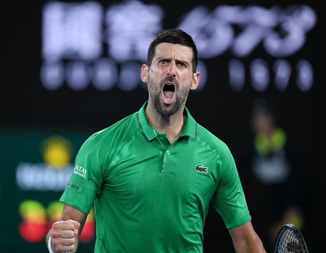 (260130) -- MELBOURNE, Jan. 30, 2026 (Xinhua) -- Novak Djokovic reacts during the men's singles semifinal match between Novak Djokovic of Serbia and Jannik Sinner of Italy at the Australian Open tennis tournament in Melbourne, Australia, Jan. 31, 2026. (Photo by Wang Shen/Xinhua)