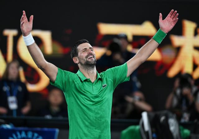 (260130) -- MELBOURNE, Jan. 30, 2026 (Xinhua) -- Novak Djokovic reacts after the men's singles semifinal match between Novak Djokovic of Serbia and Jannik Sinner of Italy at the Australian Open tennis tournament in Melbourne, Australia, Jan. 31, 2026. (Photo by Wang Shen/Xinhua)