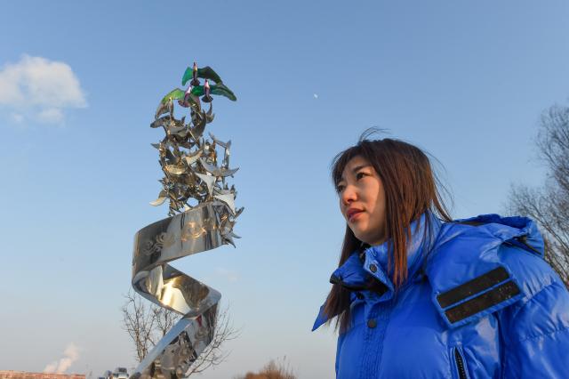 (260130) -- JILIN, Jan. 30, 2026 (Xinhua) -- Wang Tingting observes bird habitats on Changbai Island in Jilin City, northeast China's Jilin Province, Jan. 28, 2026. Wang Tingting, a post-90s bird protector, stays every day at Changbai Island wetland park, a bird paradise seated by the Songhua River in Jilin City, to care for the birds--providing food and observing their living conditions.
   In 1996, Wang Tingting's uncle Ren Jianguo dropped his business as a ferryman near Changbai Island, and became a bird keeper as he often saw people hunting birds.
   Wang took over her uncle's job when he was hospitalized for a sudden illness in 2023, and has rescued more than 50 birds on average each year.
   In recent years, local authorities of the city have continuously restored the wetland ecology of Changbai Island. Through a series of effective measures such as dispatching dedicated personnel for bird protection, standardizing viewing activities, strictly controlling sewage discharge, and scientifically restocking, Changbai Island has returned to its natural ecological beauty.
   Nowadays, over 13,000 birds come to Changbai Island for the winter every year. The spectacle of thousands of birds flocking together has become a major attraction for both citizens and tourists. (Xinhua/Zhang Nan)