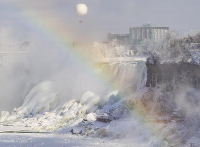(260131) -- NIAGARA FALLS, Jan. 31, 2026 (Xinhua) -- Ice- and snow-covered Niagara Falls is seen from the Canadian side in Niagara Falls, Ontario, Canada, on Jan. 30, 2026. (Photo by Zou Zheng/Xinhua)