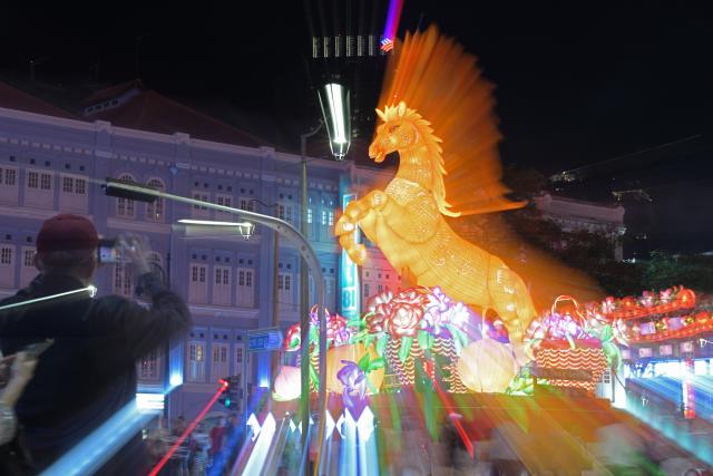 (260131) -- SINGAPORE, Jan. 31, 2026 (Xinhua) -- A lantern inspired by the Chinese zodiac horse is pictured in Singapore on Jan. 30, 2026.
  Lanterns in celebration of the upcoming Chinese New Year were officially lit up in Singapore's Chinatown on Friday evening. (Photo by Then Chih Wey/Xinhua)