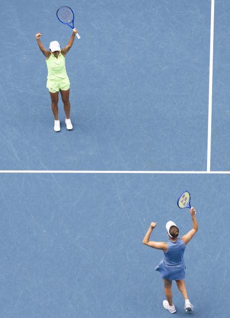 (260131) -- MELBOURNE, Jan. 31, 2026 (Xinhua) -- Zhang Shuai (L)/Elise Mertens celebrate winning the women's doubles final match between Zhang Shuai (China)/Elise Mertens (Belgium) and Anna Danilina (Kazakhstan)/Aleksandra Krunic (Serbia) at the Australian Open tennis tournament in Melbourne, Australia, Jan. 31, 2026. (Photo by Hu Jingchen/Xinhua)