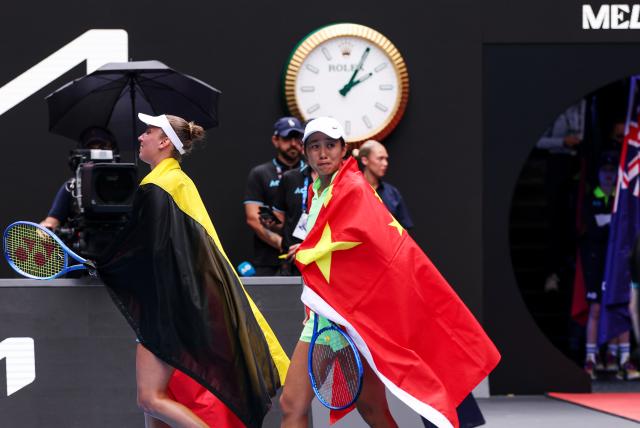 (260131) -- MELBOURNE, Jan. 31, 2026 (Xinhua) -- Zhang Shuai (R)/Elise Mertens react after winning the women's doubles final match between Zhang Shuai (China)/Elise Mertens (Belgium) and Anna Danilina (Kazakhstan)/Aleksandra Krunic (Serbia) at the Australian Open tennis tournament in Melbourne, Australia, Jan. 31, 2026. (Xinhua/Ma Ping)