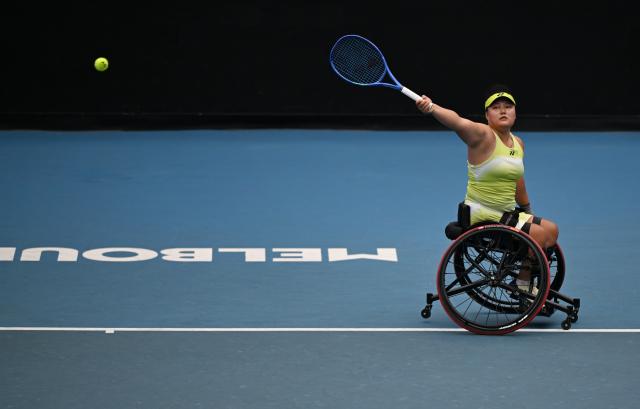 (260131) -- MELBOURNE, Jan. 31, 2026 (Xinhua) -- Li Xiaohui hits a return during the women's wheelchair singles final between Li Xiaohui of China and Diede De Groot of the Netherlands at the Australian Open tennis tournament in Melbourne, Australia, Jan. 31, 2026. (Photo by Wang Shen/Xinhua)
