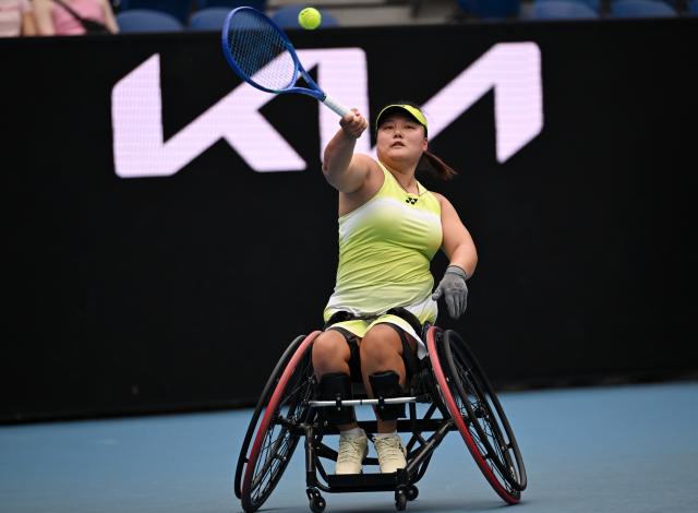 (260131) -- MELBOURNE, Jan. 31, 2026 (Xinhua) -- Li Xiaohui hits a return during the women's wheelchair singles final between Li Xiaohui of China and Diede De Groot of the Netherlands at the Australian Open tennis tournament in Melbourne, Australia, Jan. 31, 2026. (Photo by Wang Shen/Xinhua)