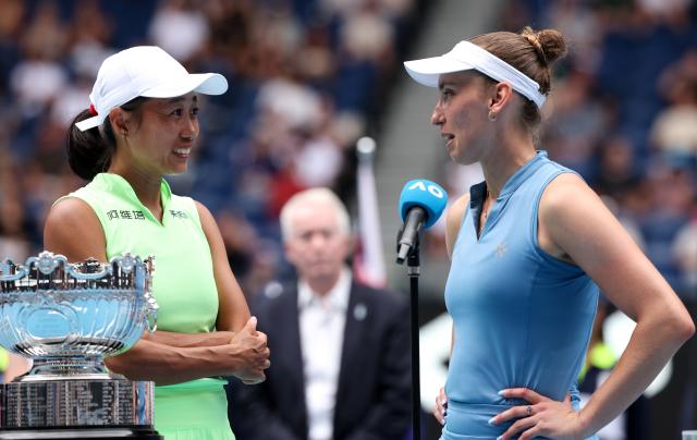 (260131) -- MELBOURNE, Jan. 31, 2026 (Xinhua) -- Zhang Shuai (L)/Elise Mertens react during the awarding ceremony for the women's doubles final match between Zhang Shuai (China)/Elise Mertens (Belgium) and Anna Danilina (Kazakhstan)/Aleksandra Krunic (Serbia) at the Australian Open tennis tournament in Melbourne, Australia, Jan. 31, 2026. (Xinhua/Ma Ping)