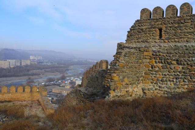 (260131) -- GORI, Jan. 31, 2026 (Xinhua) -- This photo taken on Jan. 30, 2026 shows a view from Gori Fortress in Gori, Georgia. Inscribed on Georgia's Immovable Cultural Monuments of National Significance List, Gori Fortress is an important historic site located on a rocky hill in the city of Gori. The castle was originally built in the 6th-7th centuries, took its current form by the 18th century, and was severely damaged by an earthquake in 1920. (Xinhua/Chen Junfeng)