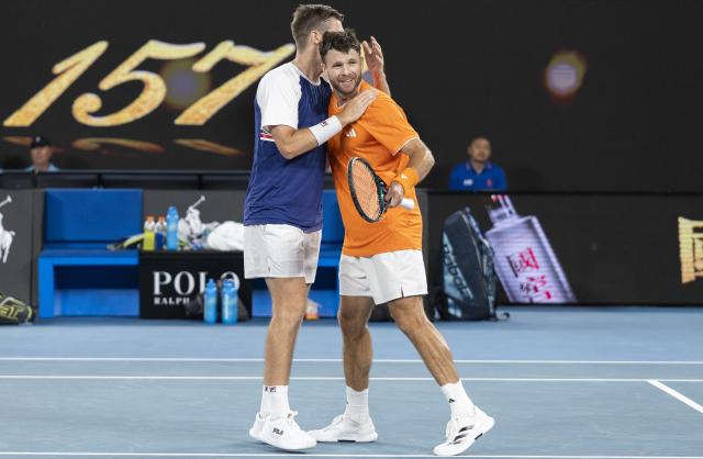 (260131) -- MELBOURNE, Jan. 31, 2026 (Xinhua) -- Christian Harrison (R)/Neal Skupski celebrate winning the men's doubles final match between Jason Kubler/Marc Polmans (Australia) and Christian Harrison (the United States)/Neal Skupski (Britain) at the Australian Open tennis tournament in Melbourne, Australia, Jan. 31, 2026. (Photo by Hu Jingchen/Xinhua)