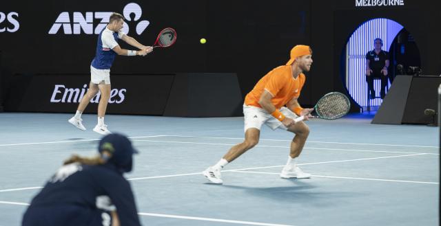 (260131) -- MELBOURNE, Jan. 31, 2026 (Xinhua) -- Christian Harrison/Neal Skupski (L) compete during the men's doubles final match between Jason Kubler/Marc Polmans (Australia) and Christian Harrison (the United States)/Neal Skupski (Britain) at the Australian Open tennis tournament in Melbourne, Australia, Jan. 31, 2026. (Photo by Hu Jingchen/Xinhua)