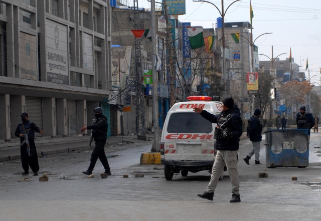 (260131) -- QUETTA, Jan. 31, 2026 (Xinhua) -- An ambulance enters an attack site in Quetta, southwest Pakistan's Balochistan province, on Jan. 31, 2026. At least 58 terrorists, 15 troops, policemen and civilians were killed during follow-up operations launched in response to coordinated attacks in Pakistan's southwestern Balochistan province, security sources said on Saturday. (Photo by Asad/Xinhua)