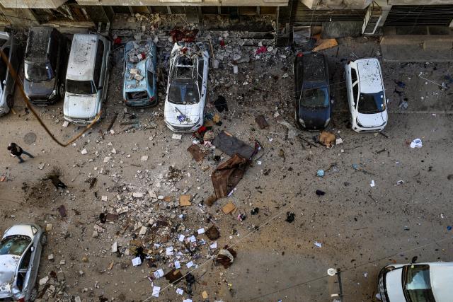 (260131) -- GAZA, Jan. 31, 2026 (Xinhua) -- Palestinians check the damage following Israeli airstrikes in Gaza City, on Jan. 31, 2026. At least 12 people were killed in Israeli airstrikes on Gaza on Saturday, multiple sources reported, citing hospital officials in the enclave. (Photo by Rizek Abdeljawad/Xinhua)