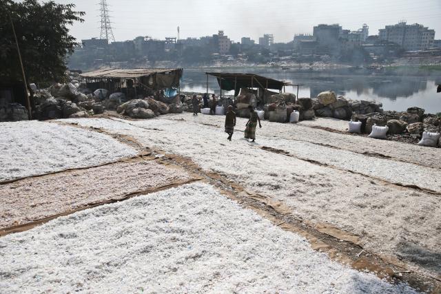 (260201) -- DHAKA, Feb. 1, 2026 (Xinhua) -- Plastic pellets are washed and aired at an informal recycling zone along the banks of the Buriganga River in Dhaka, Bangladesh, Jan. 31, 2026. (Photo by Habibur Rahman/Xinhua)