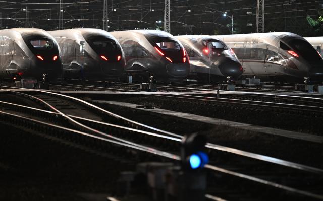 (260201) -- GUANGZHOU, Feb. 1, 2026 (Xinhua) -- This photo taken on Feb. 1, 2026 shows high-speed trains at a maintenance depot in Guangzhou, south China's Guangdong Province.
  High-speed trains across China are getting ready for the country's upcoming annual Spring Festival travel rush, also known as chunyun, which begins on Feb. 2 in 2026. Each year during this peak travel season, millions of people working, studying or living away from their hometowns return home for the Spring Festival, China's most important traditional holiday, forming the world's largest annual human migration. (Xinhua/Deng Hua)