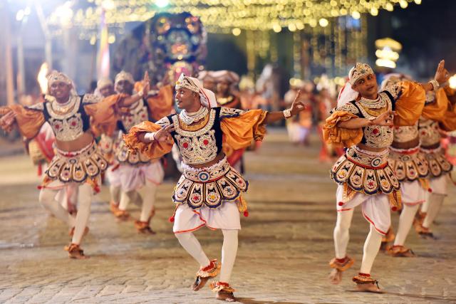 (260201) -- COLOMBO, Feb. 1, 2026 (Xinhua) -- Dancers perform traditional dances during the annual Navam Maha Perahera parade in Colombo, Sri Lanka, Jan. 31, 2026. (Photo by Gayan Sameera/Xinhua)