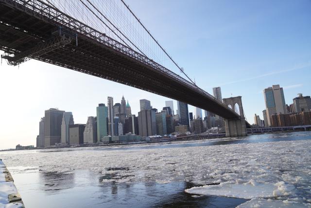 (260201) -- NEW YORK, Feb. 1, 2026 (Xinhua) -- A river is covered with floating ice in New York, the United States, Jan. 31, 2026. In the final week of January, a powerful winter storm swept across much of Canada and the United States, bringing widespread snow, sleet, and freezing rain, along with life-threatening cold and ice. (Xinhua/Zhang Fengguo)