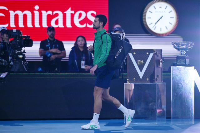 (260201) -- MELBOURNE, Feb. 1, 2026 (Xinhua) -- Novak Djokovic enters the court before the men's singles final between Carlos Alcaraz of Spain and Novak Djokovic of Serbia at the Australian Open tennis tournament in Melbourne, Australia, Feb. 1, 2026. (Photo by Wang Shen/Xinhua)