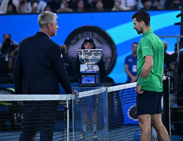 (260201) -- MELBOURNE, Feb. 1, 2026 (Xinhua) -- Novak Djokovic (R) is seen before the men's singles final between Carlos Alcaraz of Spain and Novak Djokovic of Serbia at the Australian Open tennis tournament in Melbourne, Australia, Feb. 1, 2026. (Photo by Wang Shen/Xinhua)