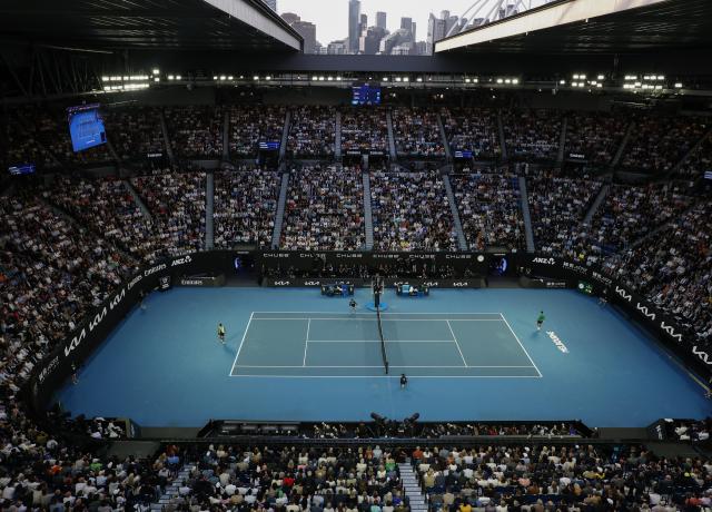 (260201) -- MELBOURNE, Feb. 1, 2026 (Xinhua) -- Carlos Alcaraz competes with Novak Djokovic during the men's singles final between Carlos Alcaraz of Spain and Novak Djokovic of Serbia at the Australian Open tennis tournament in Melbourne, Australia, Feb. 1, 2026. (Xinhua/Ma Ping)