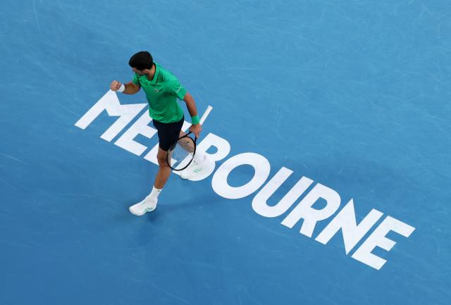 (260201) -- MELBOURNE, Feb. 1, 2026 (Xinhua) -- Novak Djokovic celebrates during the men's singles final between Carlos Alcaraz of Spain and Novak Djokovic of Serbia at the Australian Open tennis tournament in Melbourne, Australia, Feb. 1, 2026. (Xinhua/Ma Ping)