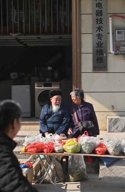 (260201) -- LIUZHOU, Feb. 1, 2026 (Xinhua) -- An old couple sells herbs at a street market at Baipeng Town of Liujiang District in Liuzhou City, south China's Guangxi Zhuang Autonomous Region, Jan. 13, 2026. In recent years, Liujiang District has relied on its thriving rural industries, vibrant agricultural economy and convenient urban transportation network to upgrade and transform local rural markets in a bid to stimulate their vitality.
   Those dynamic markets have promoted the integration of local agriculture, culture and tourism, increasing jobs and incomes for locals and helping contribute to rural revitalization. (Xinhua/Huang Xiaobang)