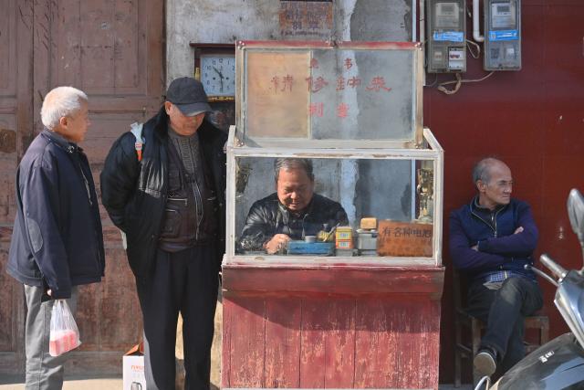 (260201) -- LIUZHOU, Feb. 1, 2026 (Xinhua) -- People stand near a watch-fixing stall at a street market at Baipeng Town of Liujiang District in Liuzhou City, south China's Guangxi Zhuang Autonomous Region, Jan. 13, 2026. In recent years, Liujiang District has relied on its thriving rural industries, vibrant agricultural economy and convenient urban transportation network to upgrade and transform local rural markets in a bid to stimulate their vitality.
   Those dynamic markets have promoted the integration of local agriculture, culture and tourism, increasing jobs and incomes for locals and helping contribute to rural revitalization. (Xinhua/Huang Xiaobang)
