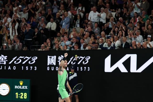 (260201) -- MELBOURNE, Feb. 1, 2026 (Xinhua) -- Carlos Alcaraz celebrates scoring during the men's singles final between Carlos Alcaraz of Spain and Novak Djokovic of Serbia at the Australian Open tennis tournament in Melbourne, Australia, Feb. 1, 2026. (Xinhua/Ma Ping)