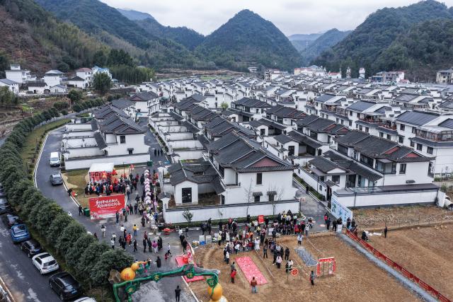 (260201) -- JIANDE, Feb. 1, 2026 (Xinhua) -- An aerial drone photo taken on Feb. 1, 2026 shows a Spring Festival cultural event in Lianhua Township, east China's Zhejiang Province. A Spring Festival cultural event was held here with great enthusiasm on Sunday. Local residents and tourists enjoyed the festive market, viewed the local art exhibition, participated in traditional games, and savored local foods. (Xinhua/Xu Yu)