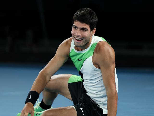 (260201) -- MELBOURNE, Feb. 1, 2026 (Xinhua) -- Carlos Alcaraz celebrates after winning the men's singles final between Carlos Alcaraz of Spain and Novak Djokovic of Serbia at the Australian Open tennis tournament in Melbourne, Australia, Feb. 1, 2026. (Xinhua/Ma Ping)