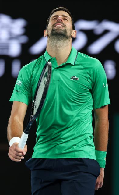 (260201) -- MELBOURNE, Feb. 1, 2026 (Xinhua) -- Novak Djokovic reacts during the men's singles final between Carlos Alcaraz of Spain and Novak Djokovic of Serbia at the Australian Open tennis tournament in Melbourne, Australia, Feb. 1, 2026. (Xinhua/Ma Ping)