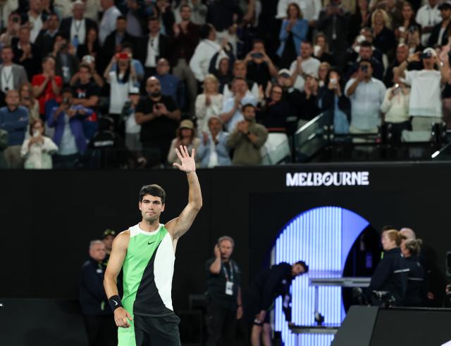 (260201) -- MELBOURNE, Feb. 1, 2026 (Xinhua) -- Carlos Alcaraz celebrates after winning the men's singles final between Carlos Alcaraz of Spain and Novak Djokovic of Serbia at the Australian Open tennis tournament in Melbourne, Australia, Feb. 1, 2026. (Xinhua/Ma Ping)