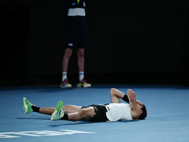 (260201) -- MELBOURNE, Feb. 1, 2026 (Xinhua) -- Carlos Alcaraz celebrates after winning the men's singles final between Carlos Alcaraz of Spain and Novak Djokovic of Serbia at the Australian Open tennis tournament in Melbourne, Australia, Feb. 1, 2026. (Photo by Wang Shen/Xinhua)