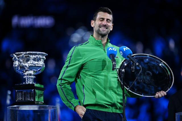 (260201) -- MELBOURNE, Feb. 1, 2026 (Xinhua) -- Novak Djokovic reacts at the awarding ceremony after the men's singles final between Carlos Alcaraz of Spain and Novak Djokovic of Serbia at the Australian Open tennis tournament in Melbourne, Australia, Feb. 1, 2026. (Photo by Wang Shen/Xinhua)