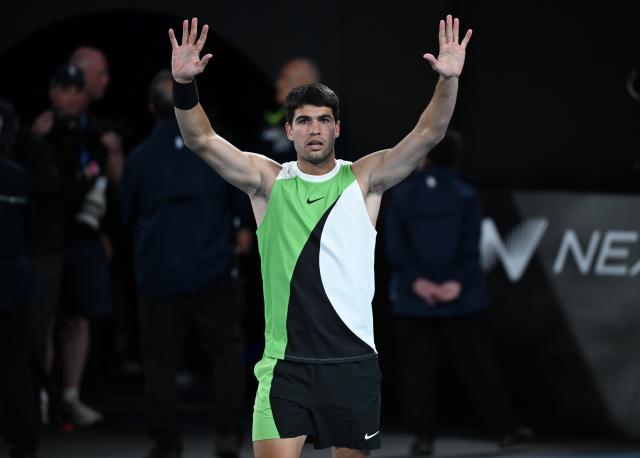 (260201) -- MELBOURNE, Feb. 1, 2026 (Xinhua) -- Carlos Alcaraz celebrates after winning the men's singles final between Carlos Alcaraz of Spain and Novak Djokovic of Serbia at the Australian Open tennis tournament in Melbourne, Australia, Feb. 1, 2026. (Photo by Wang Shen/Xinhua)