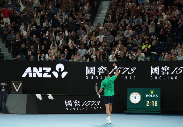 (260201) -- MELBOURNE, Feb. 1, 2026 (Xinhua) -- Novak Djokovic celebrates during the men's singles final between Carlos Alcaraz of Spain and Novak Djokovic of Serbia at the Australian Open tennis tournament in Melbourne, Australia, Feb. 1, 2026. (Xinhua/Ma Ping)
