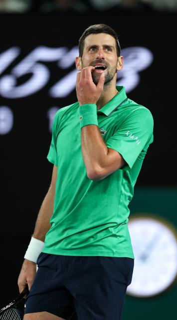 (260201) -- MELBOURNE, Feb. 1, 2026 (Xinhua) -- Novak Djokovic reacts during the men's singles final between Carlos Alcaraz of Spain and Novak Djokovic of Serbia at the Australian Open tennis tournament in Melbourne, Australia, Feb. 1, 2026. (Xinhua/Ma Ping)