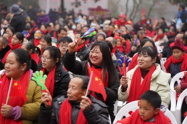 (260201) -- JINGGANGSHAN, Feb. 1, 2026 (Xinhua) -- Villagers take part in a festive gathering held during the Spring Festival gala in Shenshan Village, Jinggangshan City of east China's Jiangxi Province, Feb. 1, 2026. With the Spring Festival drawing near, Shenshan Village in Jinggangshan City held a Spring Festival gala that invited residents from seven nearby counties in east China's Jiangxi and central China's Hunan provinces to participate. (Xinhua/Zhou Mi)
