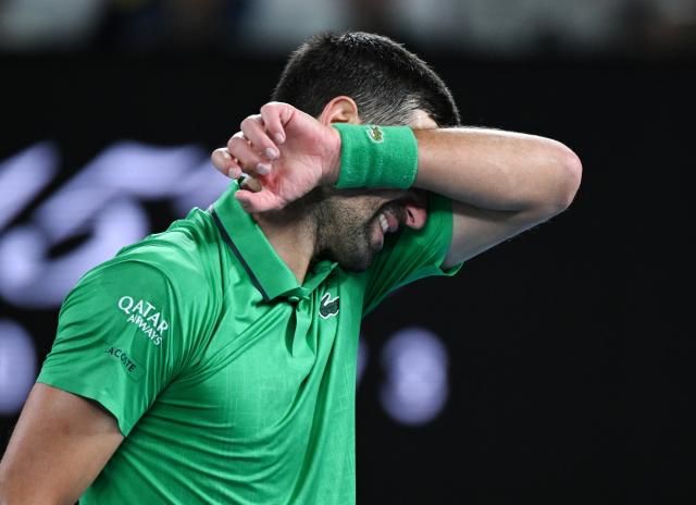 (260201) -- MELBOURNE, Feb. 1, 2026 (Xinhua) -- Novak Djokovic reacts during the men's singles final between Carlos Alcaraz of Spain and Novak Djokovic of Serbia at the Australian Open tennis tournament in Melbourne, Australia, Feb. 1, 2026. (Photo by Wang Shen/Xinhua)