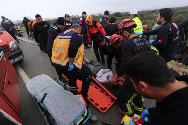(260201) -- ANKARA, Feb. 1, 2026 (Xinhua) -- Rescuers work at the site of a bus crash in southern Türkiye's Antalya province, Feb. 1, 2026. Eight people were killed and 26 others injured when a passenger bus travelling in southern Türkiye's Antalya province veered off the road and overturned into a ditch on Sunday, local broadcaster NTV reported. (Mustafa Kaya/Handout via Xinhua)