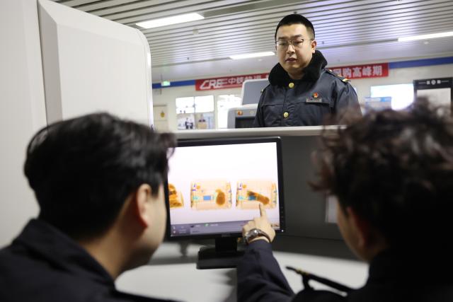 (260201) -- LANZHOU, Feb. 1, 2026 (Xinhua) -- Pet passengers undergo security inspection at Lanzhou West Railway Station, in Lanzhou, northwest China's Gansu Province, Feb. 1, 2026. With the arrival of the Spring Festival travel season, Lanzhou West Railway Station has welcomed a number of pet passengers. These pet passengers are specially monitored and looked after by train staff, traveling in dedicated pet transport cases equipped with intelligent monitoring systems.
   Since Jan. 28, the railway authorities have further increased the number of high-speed railway stations with pet consignment services. Passengers can make online reservations through the 12306 app or WeChat mini-program, making pet travel more convenient during the Spring Festival period. (Xinhua/Chen Bin)