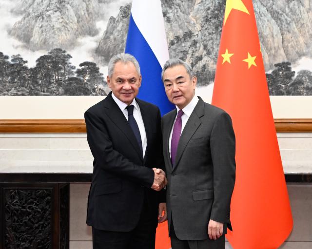 (260201) -- BEIJING, Feb. 1, 2026 (Xinhua) -- Wang Yi, a member of the Political Bureau of the Communist Party of China Central Committee and director of the Office of the Central Commission for Foreign Affairs, meets with Sergei Shoigu, secretary of the Russian Federation Security Council, in Beijing, capital of China, Feb. 1, 2026. (Xinhua/Shen Hong)