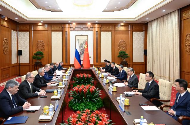 (260201) -- BEIJING, Feb. 1, 2026 (Xinhua) -- Wang Yi, a member of the Political Bureau of the Communist Party of China Central Committee and director of the Office of the Central Commission for Foreign Affairs, meets with Sergei Shoigu, secretary of the Russian Federation Security Council, in Beijing, capital of China, Feb. 1, 2026. (Xinhua/Shen Hong)