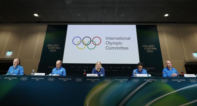 (260201) -- MILAN, Feb. 1, 2026 (Xinhua) -- International Olympic Committee (IOC) President Kirsty Coventry (C) attends the IOC Executive Board press conference at the main press center of Milan-Cortina 2026 Olympic Winter Games in Milan, Italy, Feb. 1, 2026. (Xinhua/Du Xiaoyi)