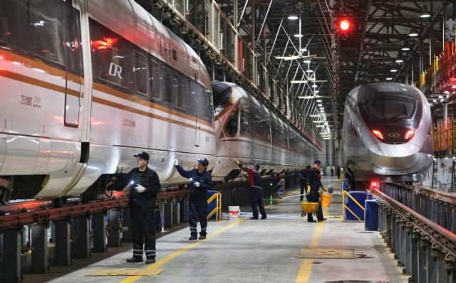 (260202) -- BEIJING, Feb. 2, 2026 (Xinhua) -- Maintenance workers inspect train carriages at a maintenance depot in Tianjin, north China, Feb. 2, 2026.
  China's annual Spring Festival travel rush began on Monday, with inter-regional trips expected to hit a record 9.5 billion.
  Passenger volumes on railways and civil aviation are forecast at 540 million and 95 million, respectively, with both total traffic and daily peak flows expected to surpass previous records.
  The Spring Festival, or the Chinese New Year, falls on Feb. 17 this year. The official holiday lasts nine days, with the travel rush running through March 13. (Photo by Yang Baosen/Xinhua)