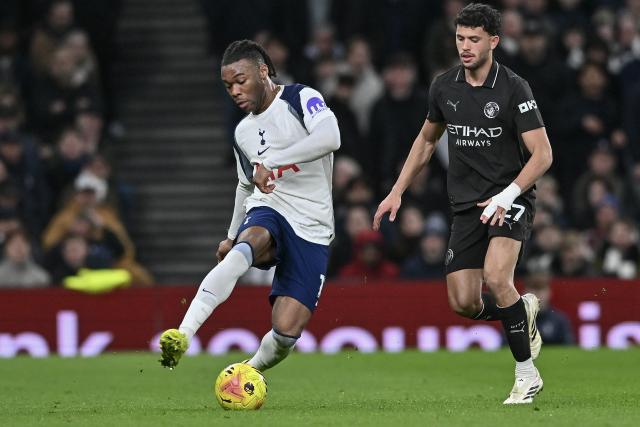 (260202) -- LONDON, Feb. 2, 2026 (Xinhua) -- Destiny Udogie (L) of Tottenham Hotspur and Matheus Nunes of Manchester City vie for the ball during the English Premier League match between Tottenham Hotspur and Manchester City in London, Britain, on Feb. 1, 2026. (Xinhua)